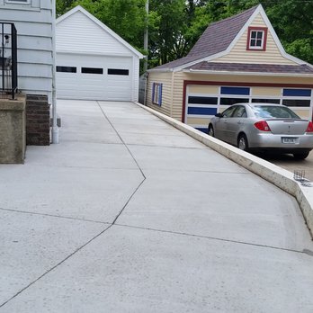 Cutter Construction - a car parked in front of a house - General Contractors Near Me - Cedar Rapids, Iowa