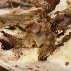 Grizzly's Wood-Fired Grill - Silverskin left on ribs is just lazy.  Makes already dry ribs even tougher to separate and eat.