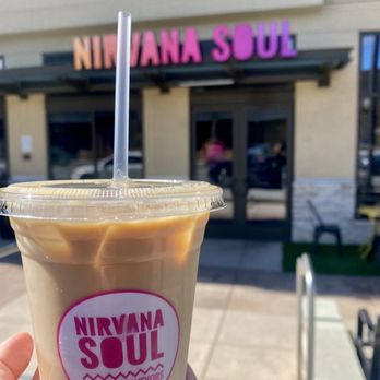 Nirvana Soul Coffee - Outside w/ iced vanilla latte - Coffee & Tea Near Me - Cupertino, California Nirvana Soul Coffee - Outside w/ iced vanilla latte - Coffee & Tea Near Me - Cupertino, California