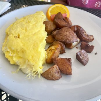 Sage Biscuit Cafe - Three Cheese Omelette with Potatoes - Breakfast & Brunch Near Me - Bradenton, Florida Sage Biscuit Cafe - Three Cheese Omelette with Potatoes - Breakfast & Brunch Near Me - Bradenton, Florida