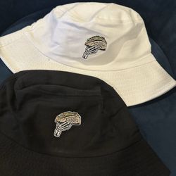 Inkwell Custom Printing - Hats with embroidered skeleton hand holding taco