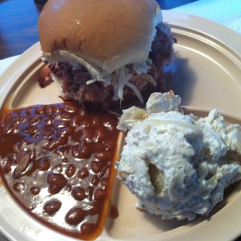 Whole Hog Cafe - Pulled pork sandwich topped with coleslaw and sides of baked beans and potato salad. Very tasty. - Barbeque Near Me - Fayetteville, Arkansas Whole Hog Cafe - Pulled pork sandwich topped with coleslaw and sides of baked beans and potato salad. Very tasty. - Barbeque Near Me - Fayetteville, Arkansas