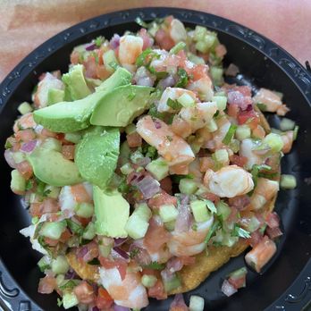 Ceviiche - I had already cut up the avocado before i took the picture.  The presentation was lovely before with the avocado spread over the top. - Seafood Near Me - Ventura, California