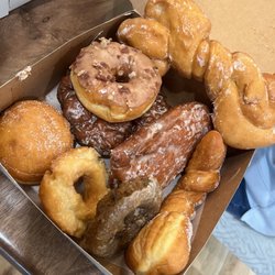 Apple fritter, bear claw (Apple cinnamon mixture) Maple Bacon, Glazed twist, sugar twist, blueberry, sour cream, raspberry jelly filled