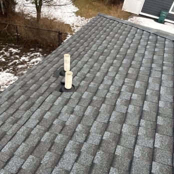 Performance Roofing and Siding - Clean lines and high-performance materials on this finished roof replacement in Grand Rapids. - Roofing Near Me - Grand Rapids, Michigan