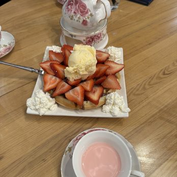 Proper Rose Garden - Waffle (with vanilla ice cream, strawberries, and banana) with Nutella sauce. - Themed Cafes Near Me - Katy, Texas Proper Rose Garden - Waffle (with vanilla ice cream, strawberries, and banana) with Nutella sauce. - Themed Cafes Near Me - Katy, Texas