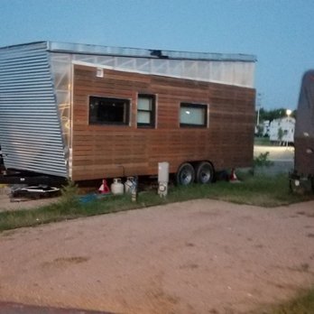 Evergreen RV Park - Tiny house at the RV Park lot size next to it visual - RV Parks Near Me - Austin, Texas Evergreen RV Park - Tiny house at the RV Park lot size next to it visual - RV Parks Near Me - Austin, Texas