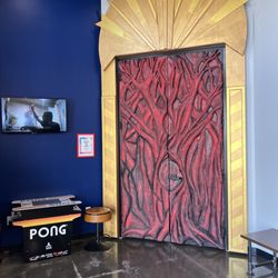 Red Door Escape Room - The main red door to enter for this event.