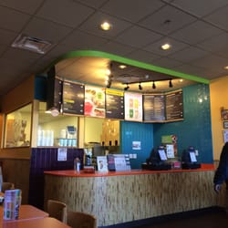 Tropical Smoothie Cafe - The counter with menu.