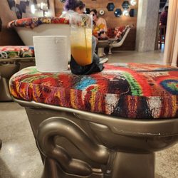 The Lasseter - My drink on a toilet Ottoman lol