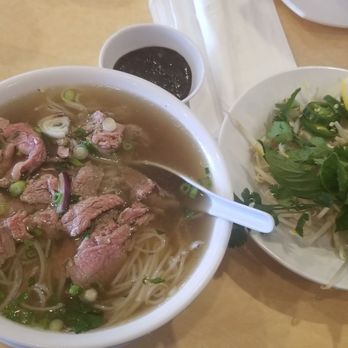 Mai Lee - Pho Tai (Rice noodle soup with beef) and a bean sprout salad with dressing - Vietnamese Near Me - Saint Louis, Missouri Mai Lee - Pho Tai (Rice noodle soup with beef) and a bean sprout salad with dressing - Vietnamese Near Me - Saint Louis, Missouri