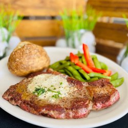 Byrncliff Golf Resort & Banquets - Blue cheese rib eye steak at Byrncliff