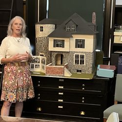 Millburn-Short Hills Historical Society - A former resident of Cora Hartshorn's home, in front of the dollhouse replica her dad commissioned.