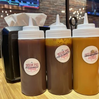 Neon Pig - 3 types of barbecue sauces. - Barbeque Near Me - Thackerville, Oklahoma Neon Pig - 3 types of barbecue sauces. - Barbeque Near Me - Thackerville, Oklahoma