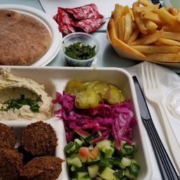 Falafel Plate ($15) with whole wheat pita and an order of french fries ($5)