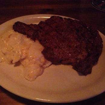 Down the Street - 14oz ribeye and scalloped potatoes $16 - Sports Bars Near Me - Houston, Texas Down the Street - 14oz ribeye and scalloped potatoes $16 - Sports Bars Near Me - Houston, Texas