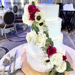 To the Point Celebrations - No florist - no problem  We can decorate your cake with your flowers...