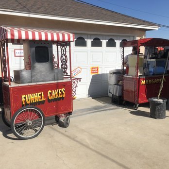Let's Have A Cart Party - Funnel cake and drinks carts. The drinks cart had sno cones, lemonade, and margaritas. - Caterers Near Me