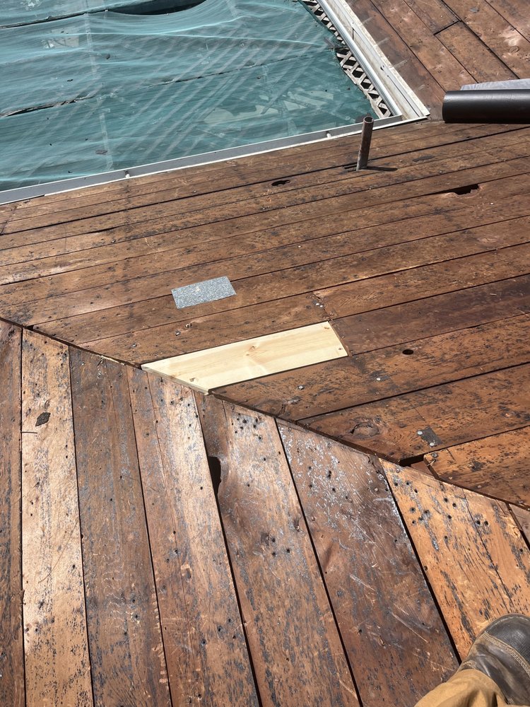 Slide of Fredy's Roofing