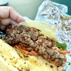 Carnaless - Vegan brisket taco; dry rubbed tempeh with pickled carrots, jalapeño slaw. Yes please!