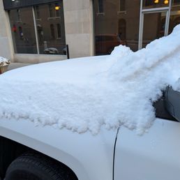 Snow covered vehicle from valet. Snow covered vehicle from valet.