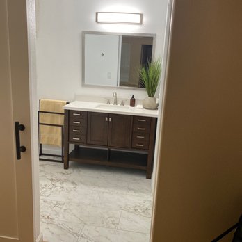 Leo’s Handyman Services - New vanity, mirror and centered vanity light. - Flooring Near Me - Henderson, Nevada Leo’s Handyman Services - New vanity, mirror and centered vanity light. - Flooring Near Me - Henderson, Nevada