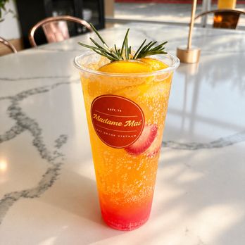 Madame Mai - Fresh strawberry and peach soda - Vietnamese Near Me - Park Row, Texas
