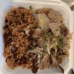 Romeito Cuban Restaurant - Lechón asado with arroz morro (Moro rice: rice with black beans and pork belly)