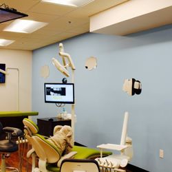 Tree House Dentistry For Kids - Treatment area, with TVs on the ceiling!