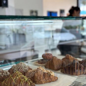 Blue Hummingbird Roastery - croissants and pastries on display - Coffee Roasteries Near Me - Irvine, California Blue Hummingbird Roastery - croissants and pastries on display - Coffee Roasteries Near Me - Irvine, California