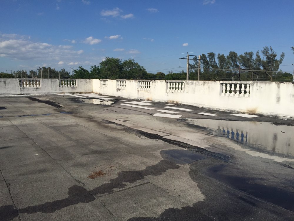 Slide of Rhino Roof Protection Coatings and Painting