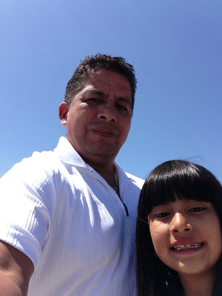 Slide of Caruzo's Roofing Contractors