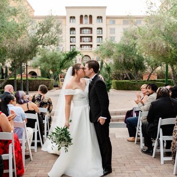 A Moment in Time Events Venue - Second kiss as husband and wife coming back up the aisle in Lake Las Vegas village - Venues & Event Spaces Near Me - Henderson, Nevada A Moment in Time Events Venue - Second kiss as husband and wife coming back up the aisle in Lake Las Vegas village - Venues & Event Spaces Near Me - Henderson, Nevada