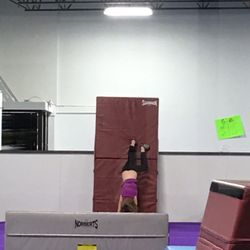 Badger Gymnastics Academy - Handstands against the mat