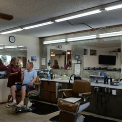 Toby Barber shop - Toby talking to one of her customers.