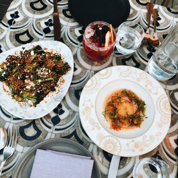 Margot - Black bird cocktail ($14), charred broccoli ($17), yellowtail crudo ($18) - Spanish Near Me - Culver City, California Margot - Black bird cocktail ($14), charred broccoli ($17), yellowtail crudo ($18) - Spanish Near Me - Culver City, California
