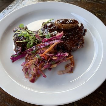 Santiago's Bodega - Beef short ribs. You can order them the way you want them cook. Tender and delicious as well. - Tapas Bars Near Me - Orlando, Florida