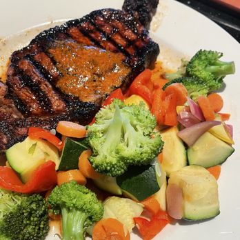 Firebirds Wood Fired Grill - Ribeye steak with vegetables - Steakhouses Near Me - Niles, Ohio