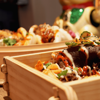 Mingle by Mr and Mrs Bao - Our loaded beef fire fries with baos in the background. - Asian Fusion Near Me - London, Ontario Mingle by Mr and Mrs Bao - Our loaded beef fire fries with baos in the background. - Asian Fusion Near Me - London, Ontario