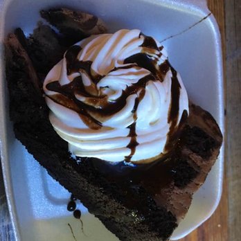 The Olde Log Inn - Chocolate cake slice, at the Shaughnessy's Olde Log Inn in Lake George, NY. - American Near Me - Lake George, New York The Olde Log Inn - Chocolate cake slice, at the Shaughnessy's Olde Log Inn in Lake George, NY. - American Near Me - Lake George, New York