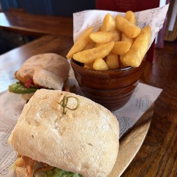 The Grapes - Chicken sandwich and chips - Pubs Near Me - London, XGL The Grapes - Chicken sandwich and chips - Pubs Near Me - London, XGL
