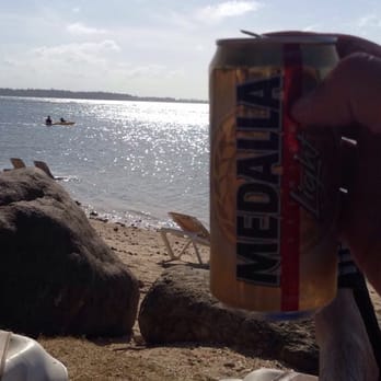 Gran Meliá - Carson brought his own beer to the beach. - Resorts Near Me - Río Grande, Puerto Rico