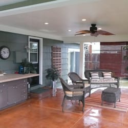 Rapid Repair and Remodel - Patio cover. Stained concrete slab and footing. Recessed lighting and fan for those hot days.