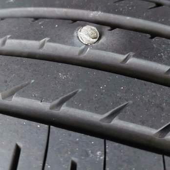 American Tire Depot - Tire with bolt - Auto Repair Near Me - Clovis, California American Tire Depot - Tire with bolt - Auto Repair Near Me - Clovis, California