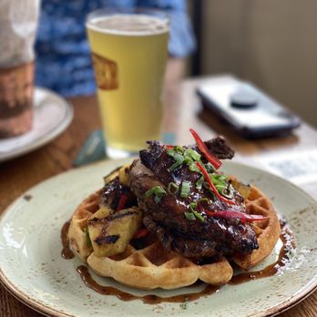 Alfie's - jerk chicken and waffle - New American Near Me - New York, New York Alfie's - jerk chicken and waffle - New American Near Me - New York, New York