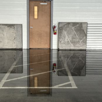 Lavella - flooding in garage, 2nd floor, 24 hours after rain storm - Apartments Near Me - Austin, Texas Lavella - flooding in garage, 2nd floor, 24 hours after rain storm - Apartments Near Me - Austin, Texas
