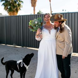 Julie Laflamme Photography - Intimate moment with bride, groom, and their puppy.
