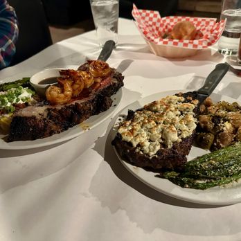 Lassen Steakhouse - prime rib & prawns with baked potato + ribeye with blue cheese crust and veggies - Steakhouses Near Me - Vina, California
