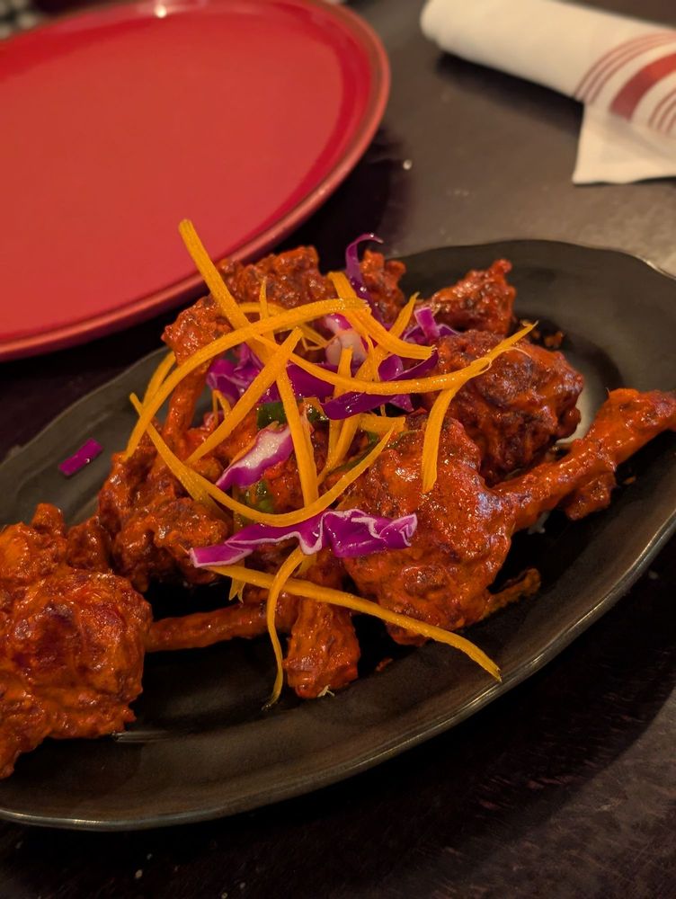 Veedu Indian Kitchen & Lounge Logo