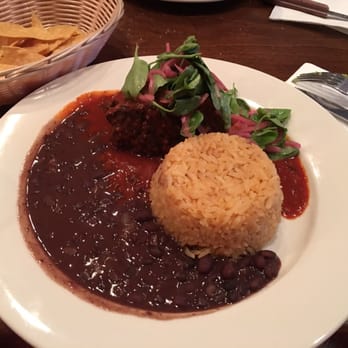 Cascalote Latin Bistro - Black beans are fresh and home made the rice was moist * Warning Red sauce by the beans is spicy - Latin American Near Me - New York, New York Cascalote Latin Bistro - Black beans are fresh and home made the rice was moist * Warning Red sauce by the beans is spicy - Latin American Near Me - New York, New York